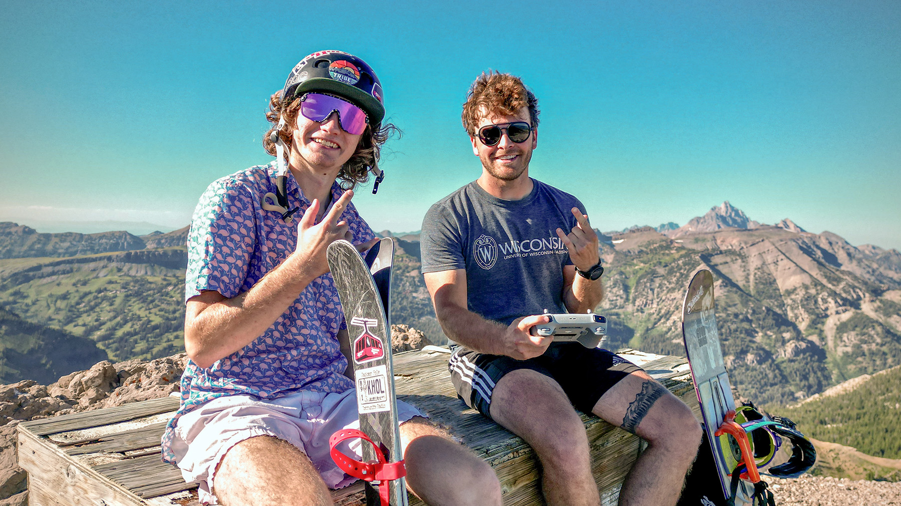 Two guys hanging out on top of Cody Peak