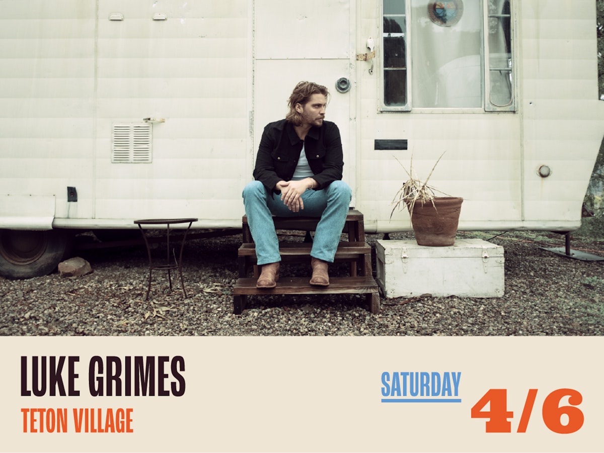 Luke Grimes sitting on stairs of mobile home