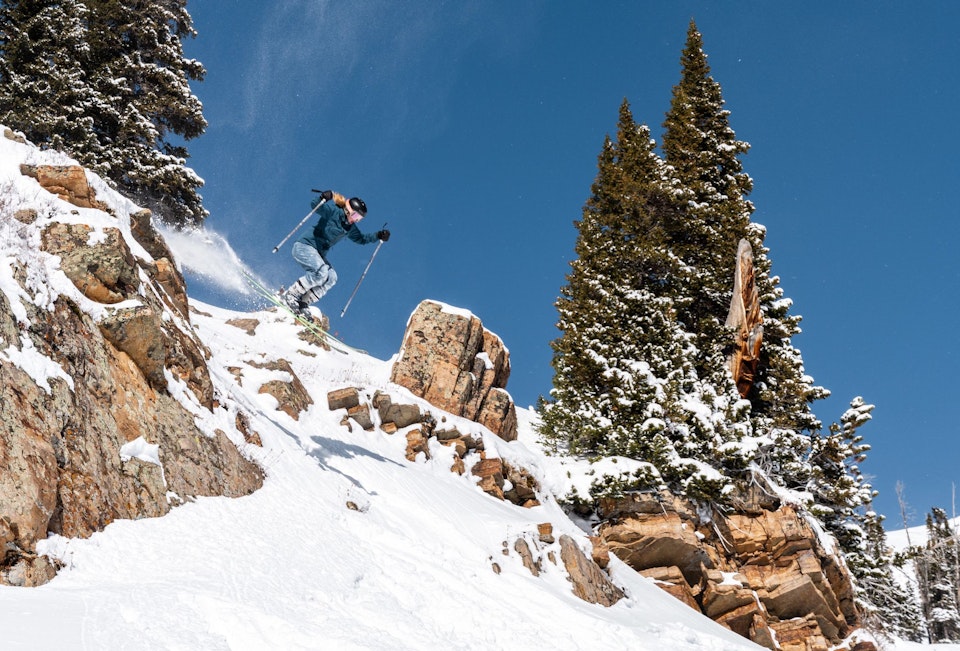 getting air while skiing in jeans