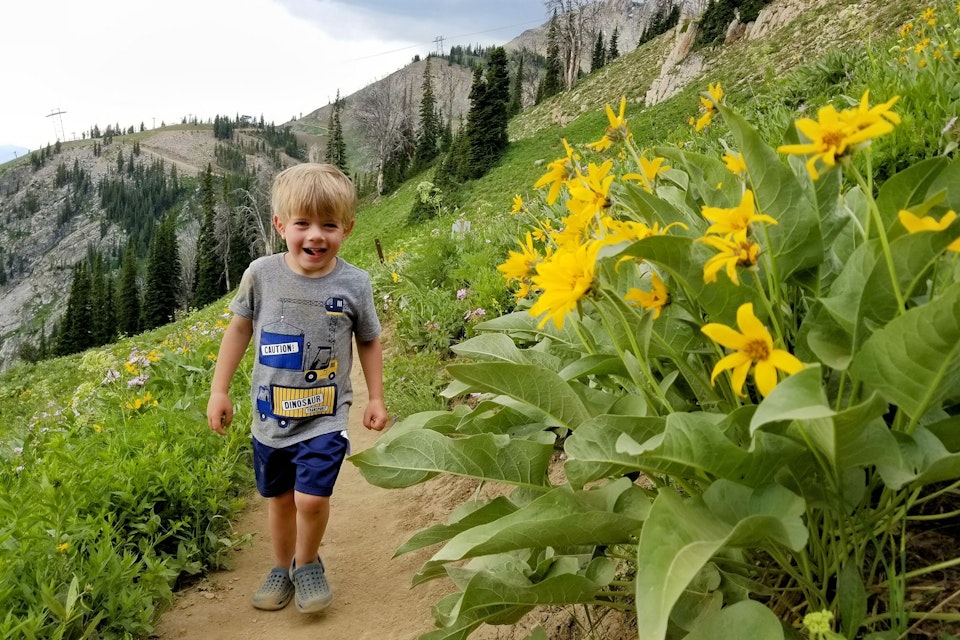 young boy hiking