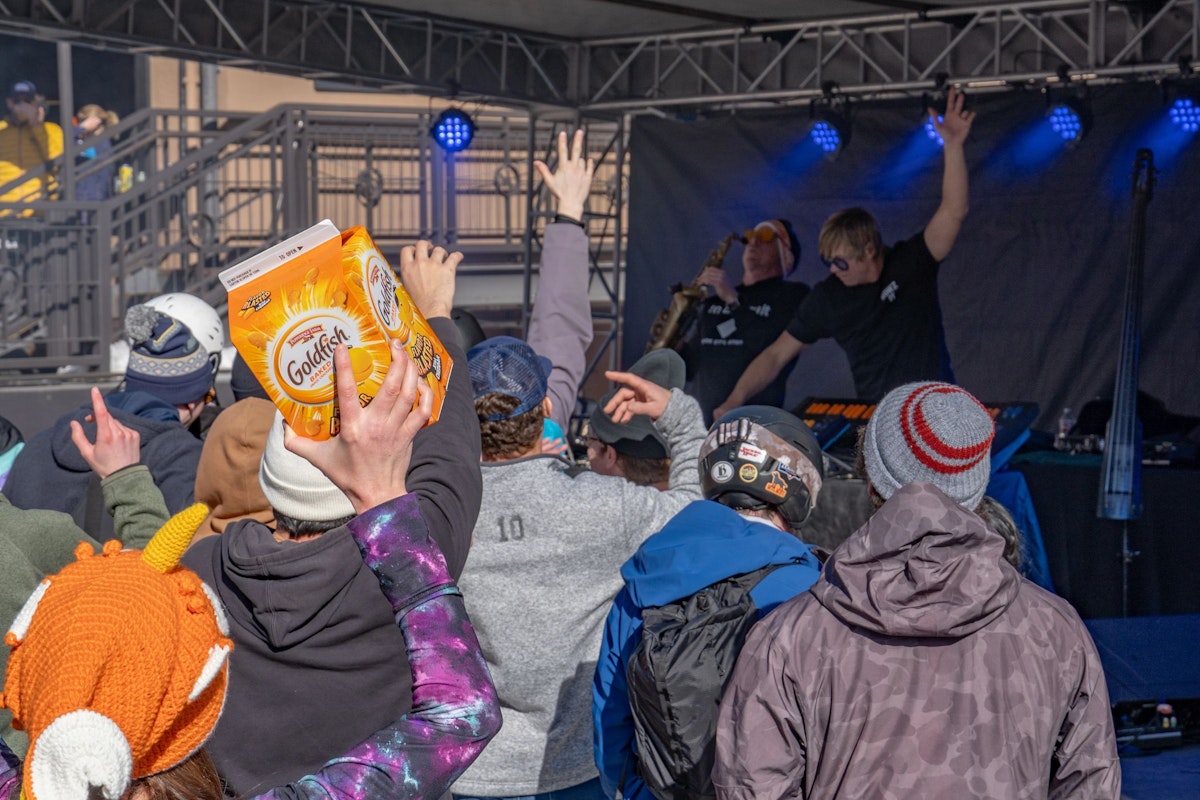 GoldFish at Road to Rendezvous with a fan holding box of Goldfish