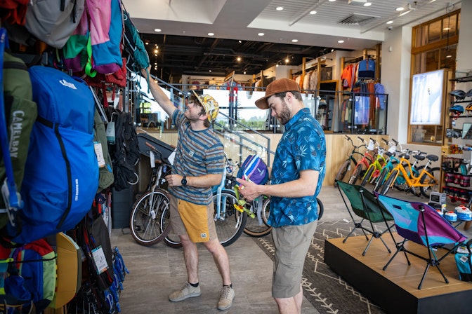men shopping at tvs