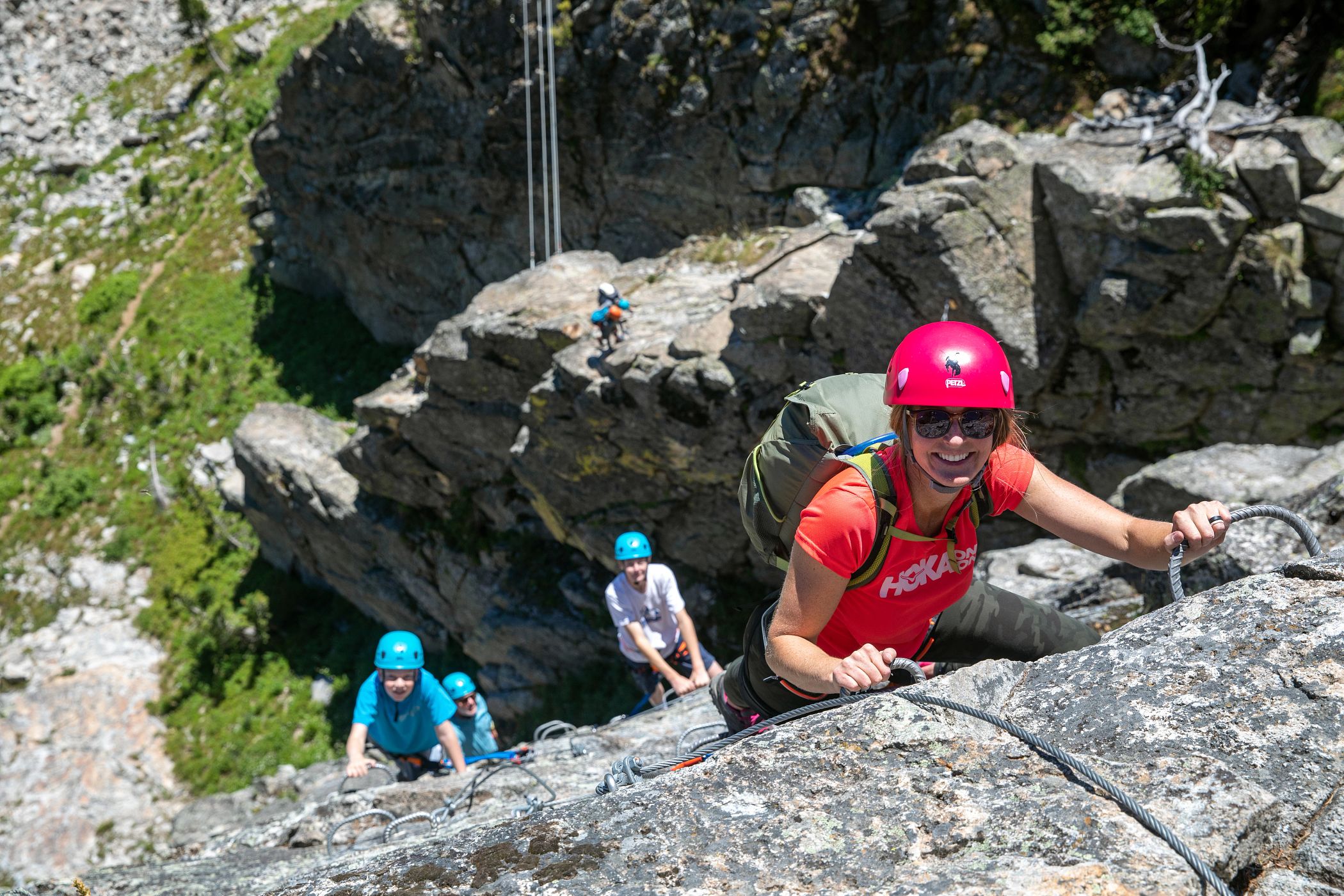 family climbing the Via Ferrata