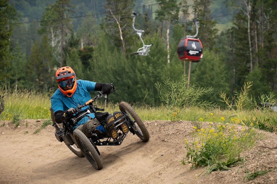 Man riding adaptive bike in bike park