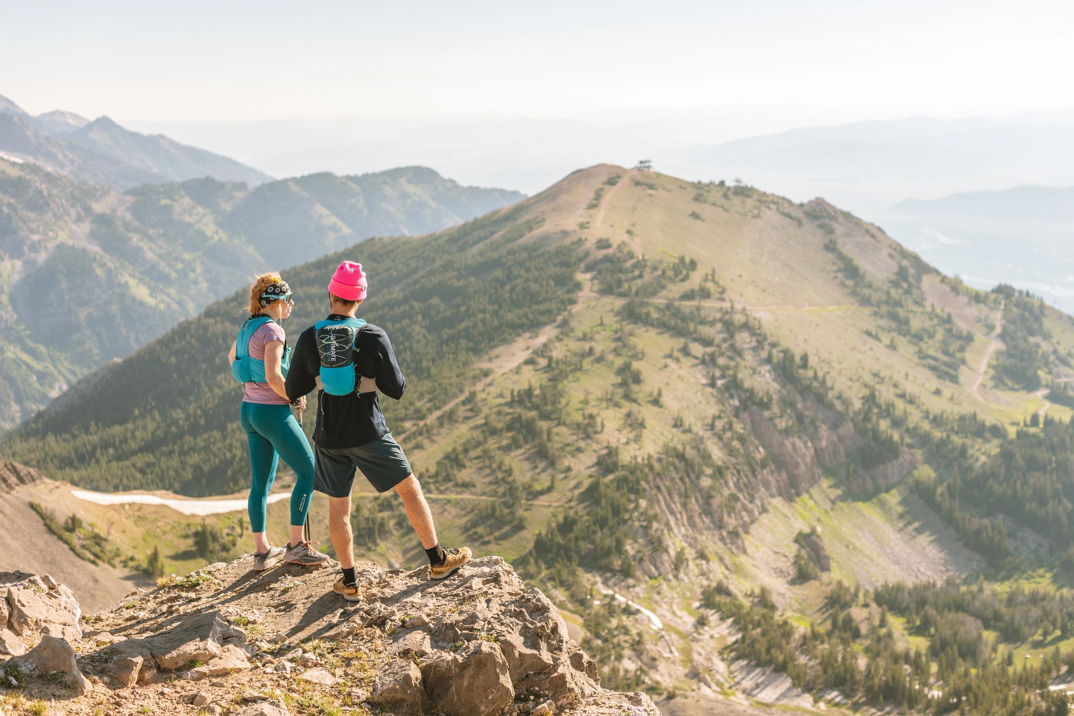 Two hikers enjoying the view of Jackson Hole Mountain Resort