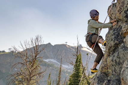 Man rock climbing at Jackson Hole