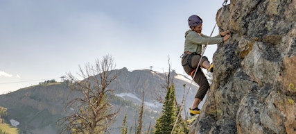 Man rock climbing at Jackson Hole