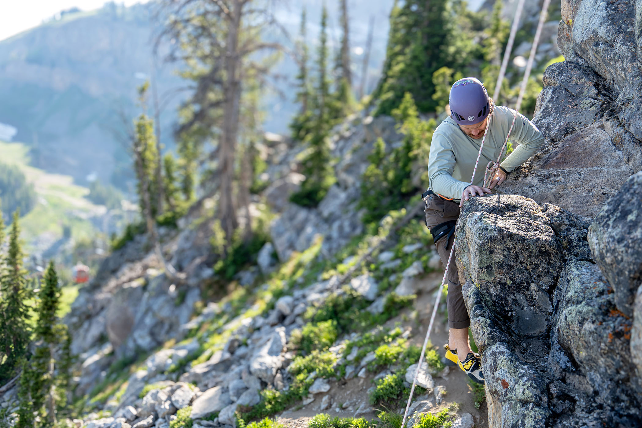Man rock climbing at Jackson Hole