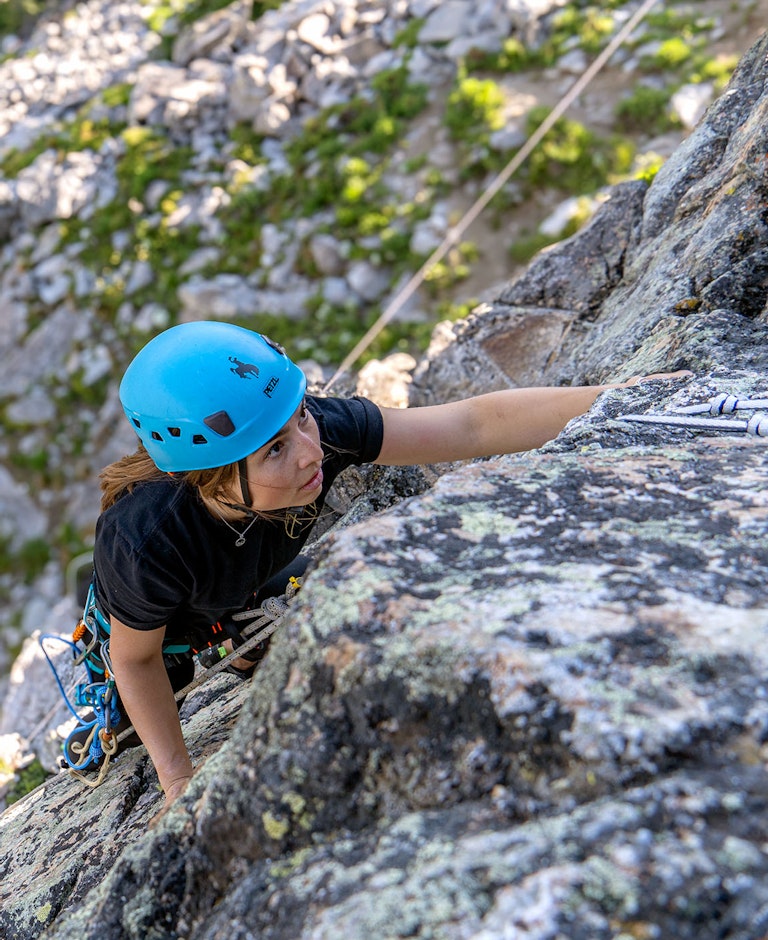 Woman rock climbing