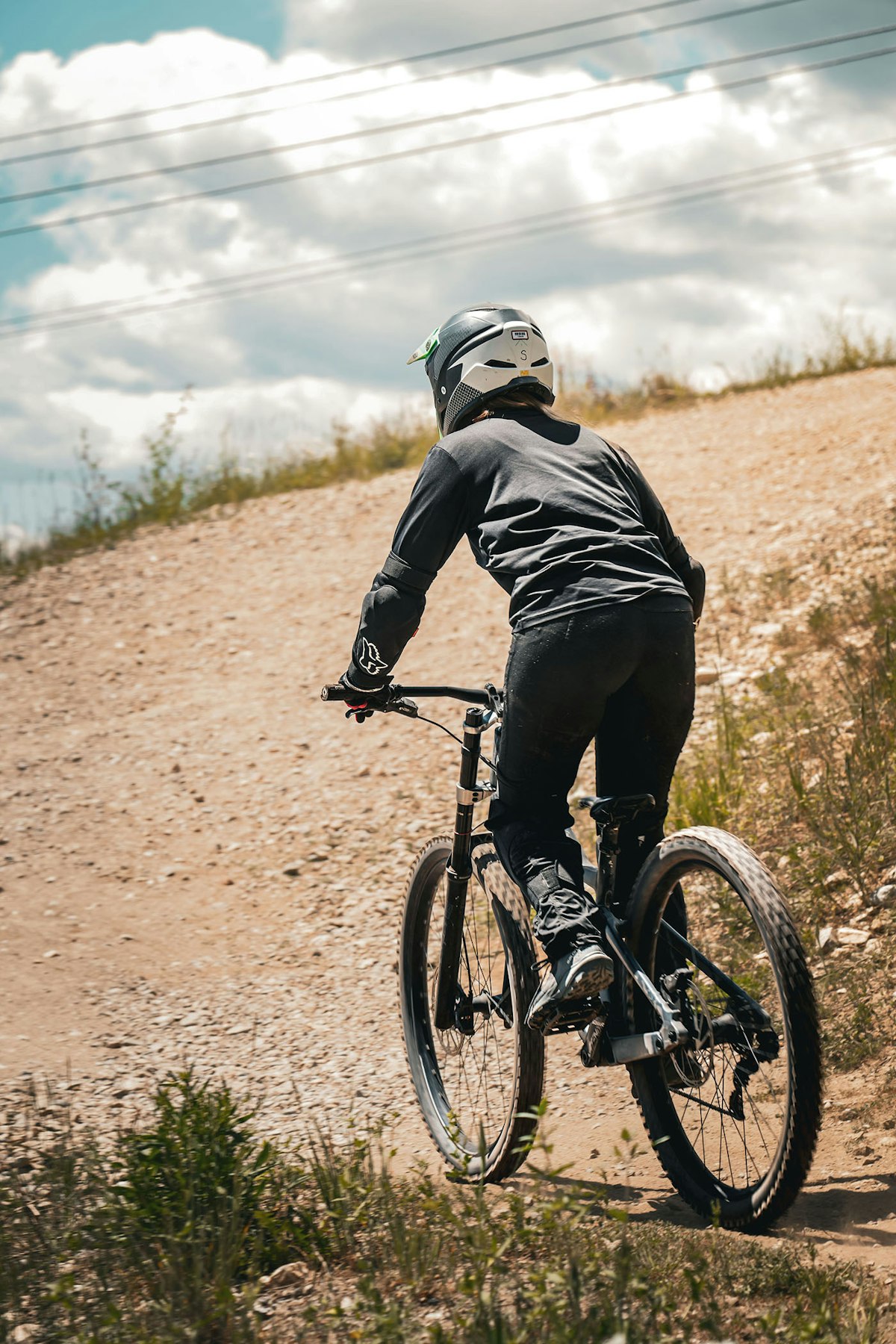 woman mountain biking