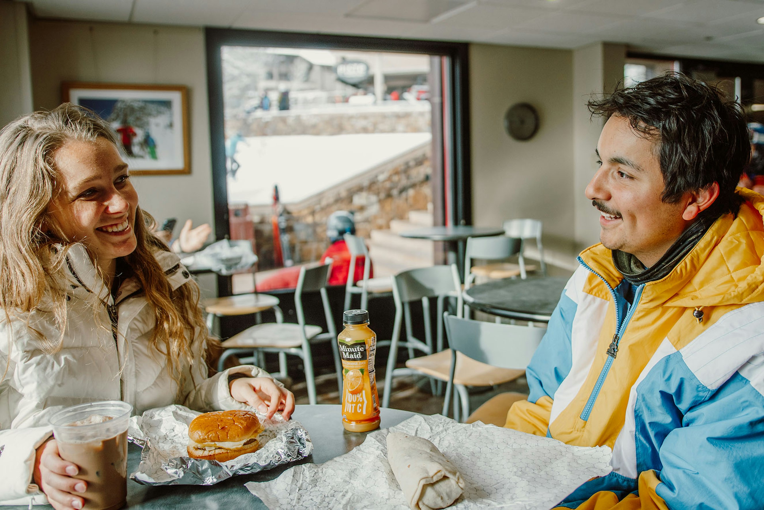 People enjoying food at cafe 6311