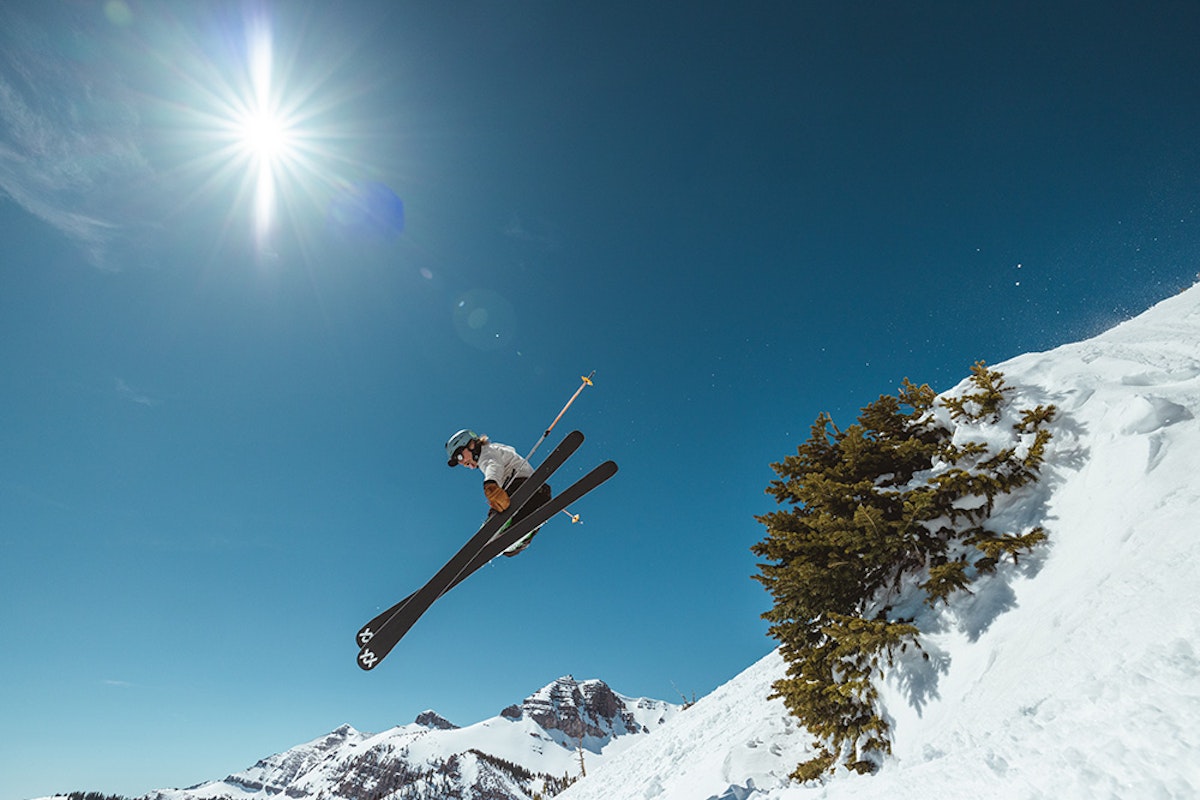 jumping over bush on skis