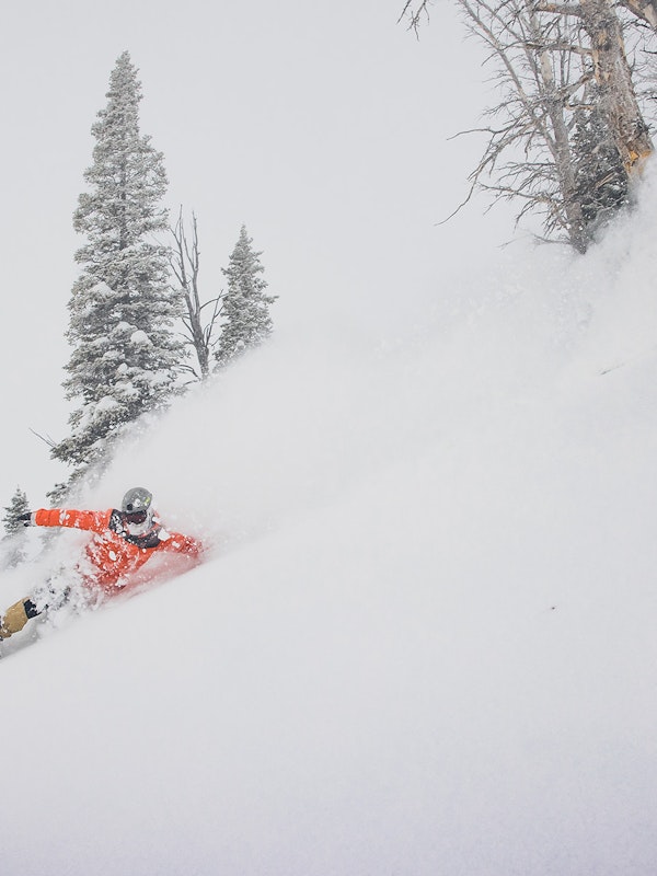 snowboarding ripping powder