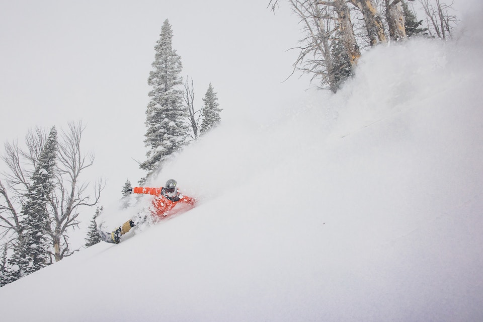 snowboarding ripping powder