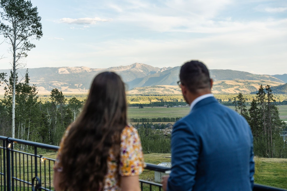 Wedding guest looking over the valley