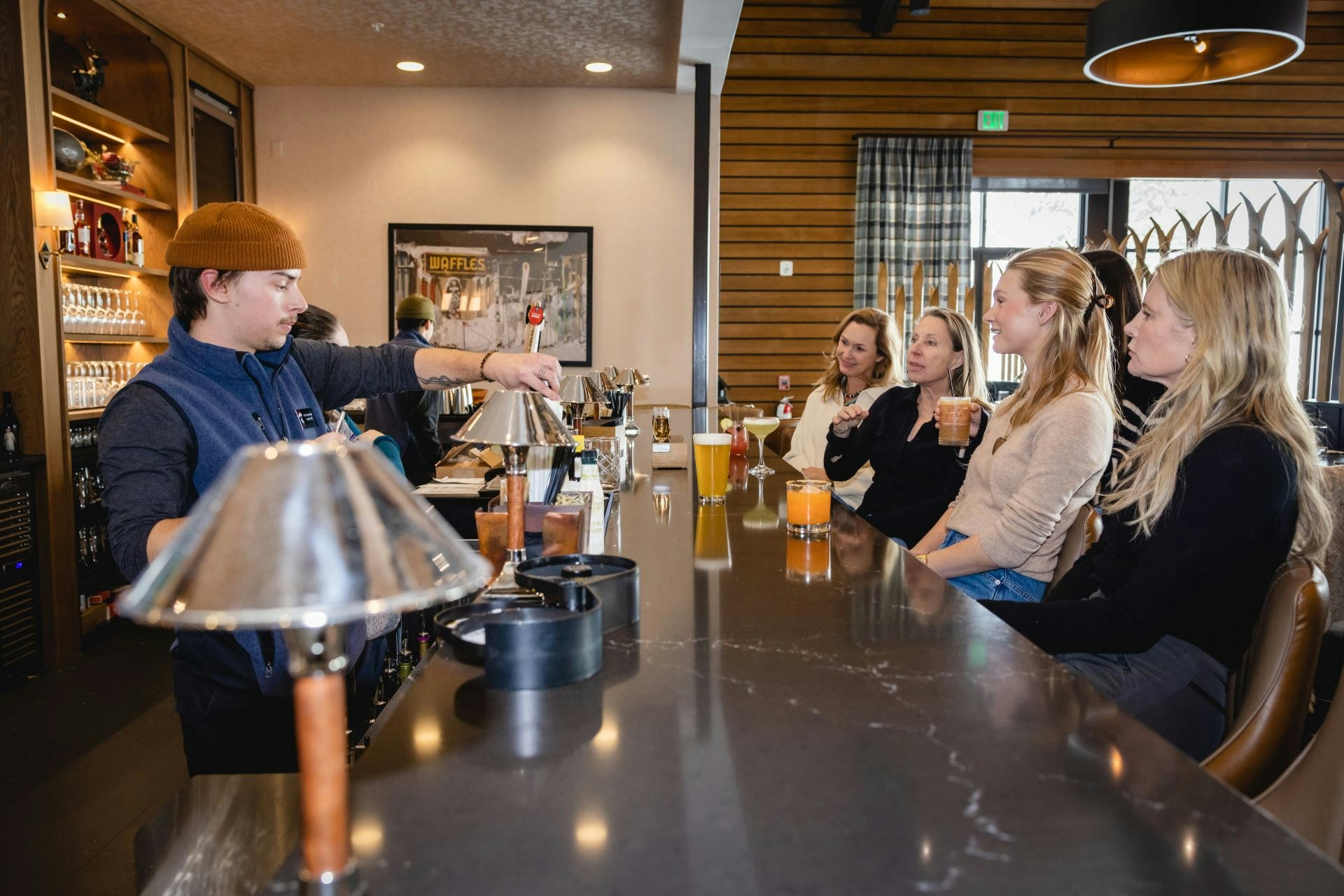 Women siiting at Trapper's bar