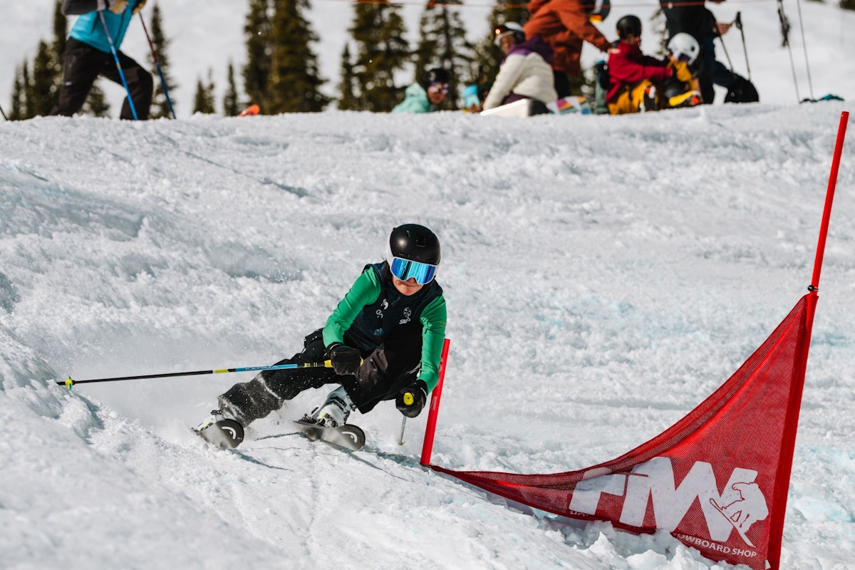 Skiier turning around gate in Dick's Ditch