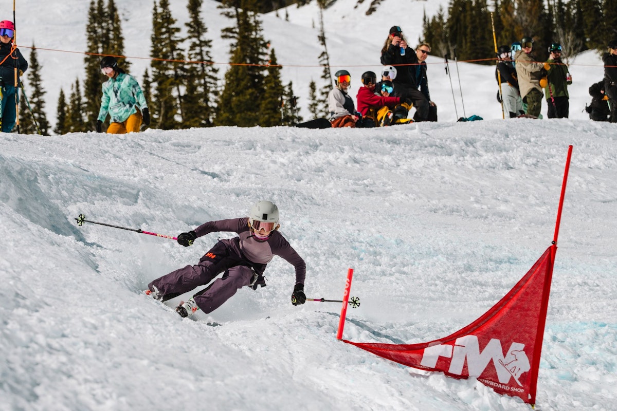 Skiier turning around gate in Dick's Ditch