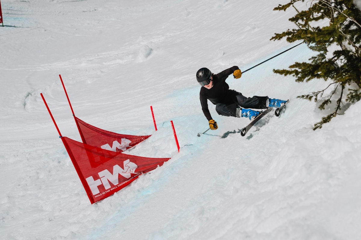 Skiier turning around gate in Dick's Ditch