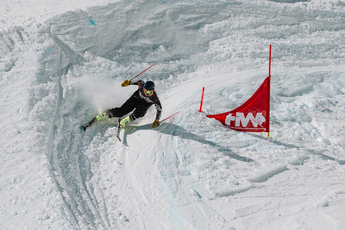 Skiier turning around gate in Dick's Ditch