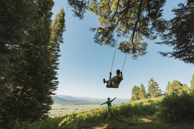 Hikers taking a break on the swing