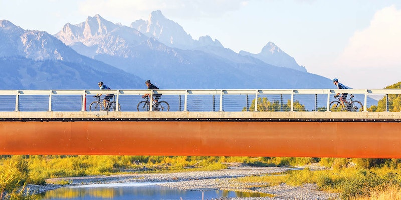 Bikers in front of the tetons
