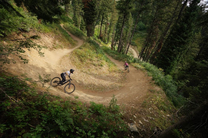 Women riding the mountain bike park at jackson hole mountain resort