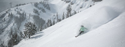 snowboarding ripping powder