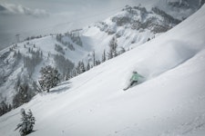 snowboarding ripping powder