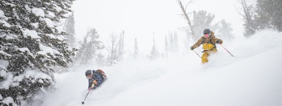 Friedns enjoying powder together