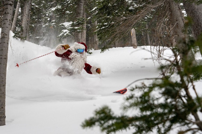 Santa Claus skiing deep powder at Jackson Hole Mountain Resort