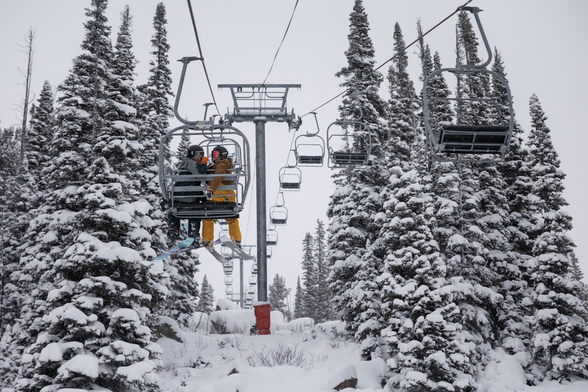 Skiers on the chairlift