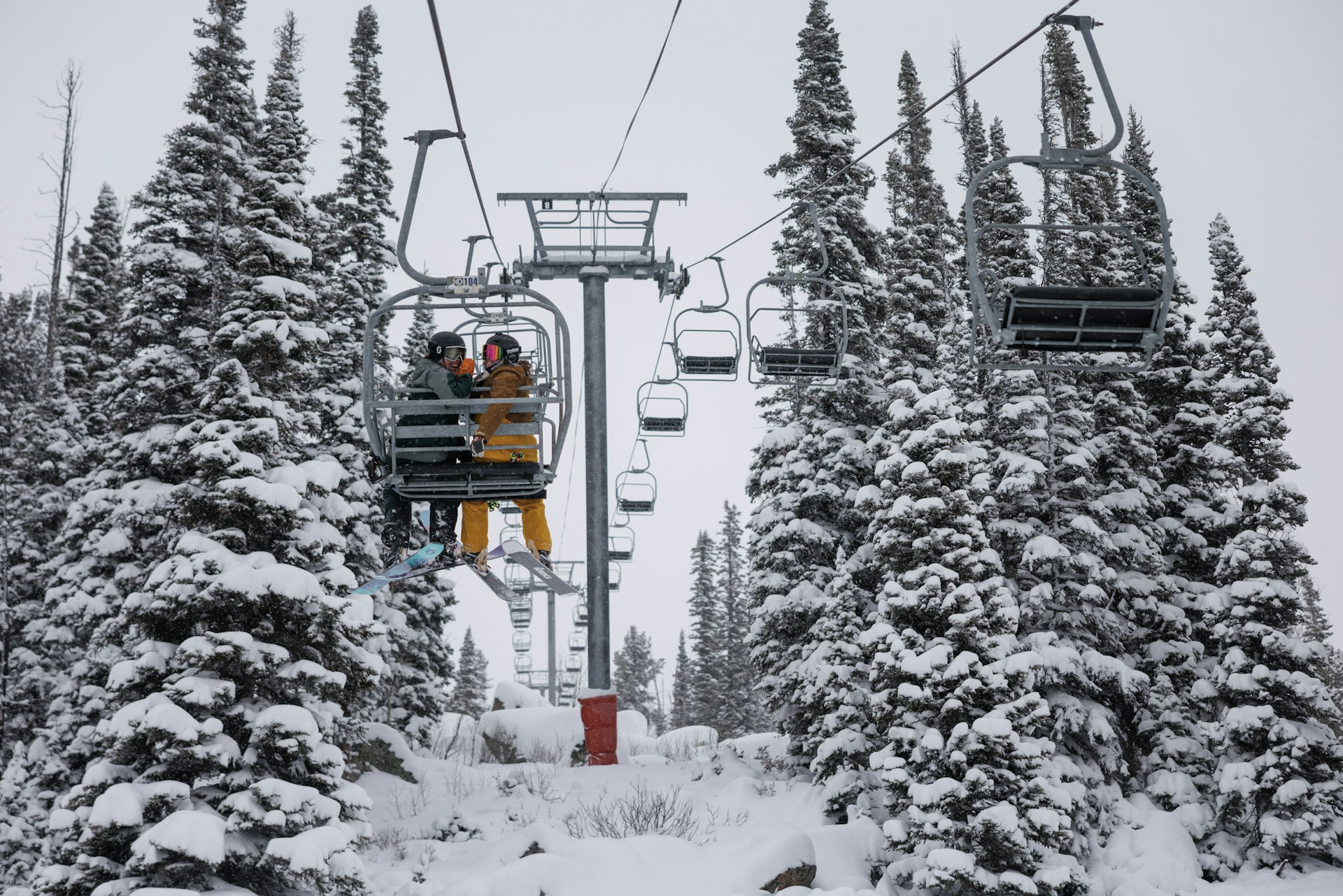 Skiers on the chairlift