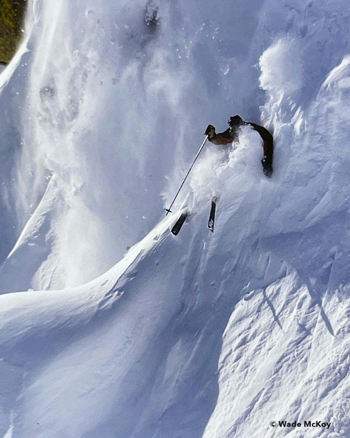 skier making deep turn