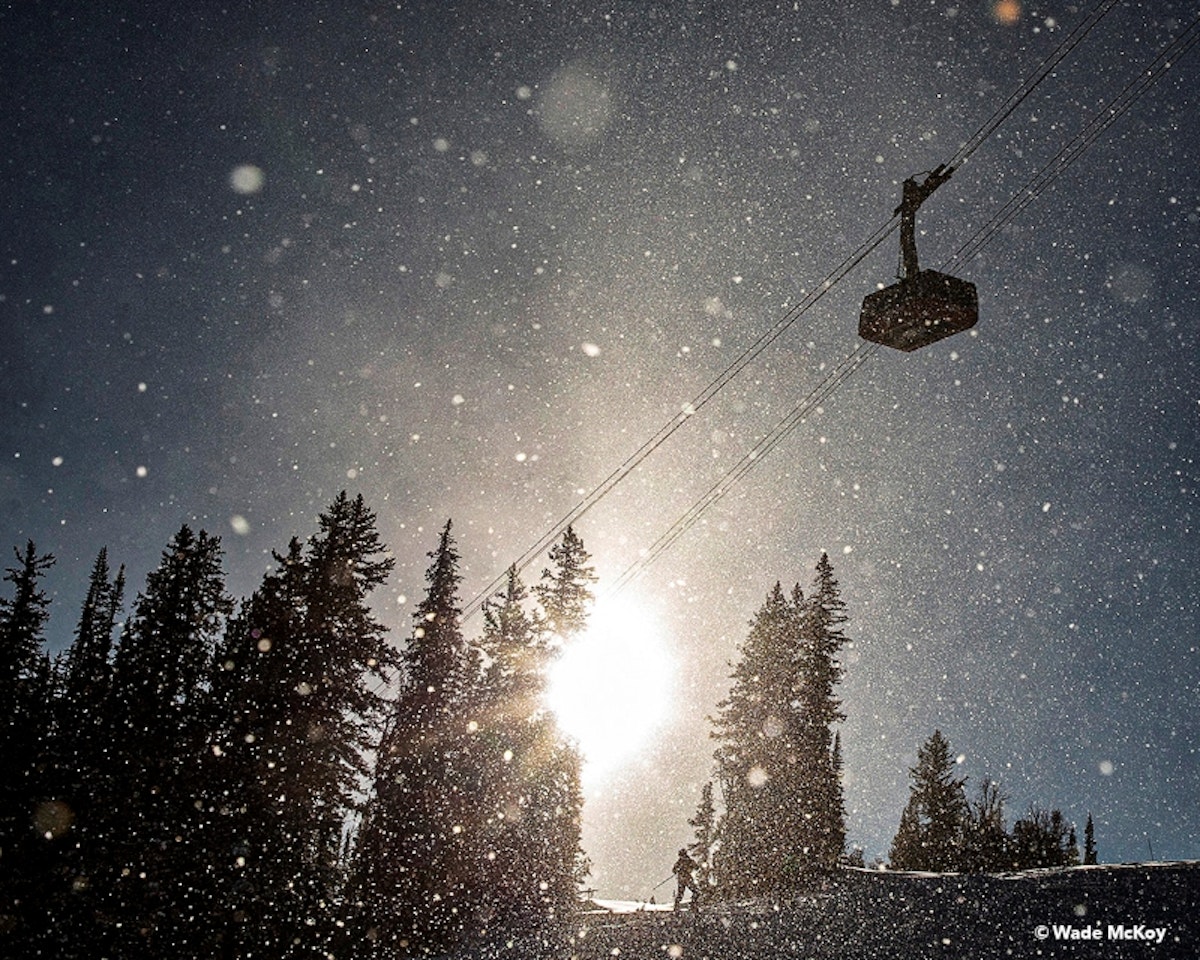 Tram with snow falling