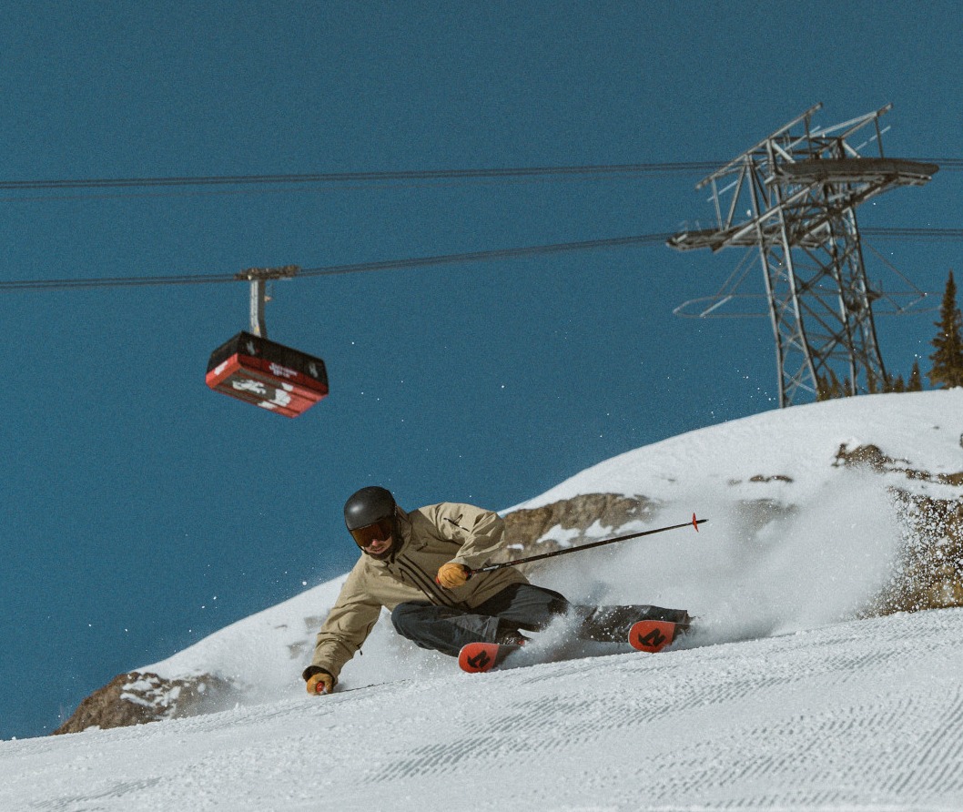 Carving low under the tram