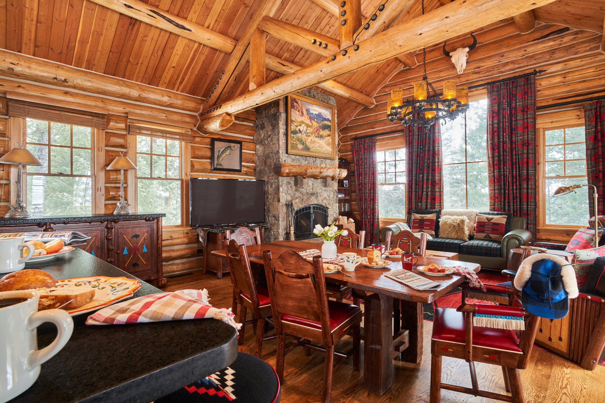 Cozy log cabin with set breakfast table