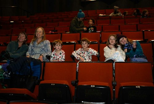 Family watching a holiday movie