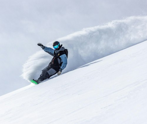 Snowboarder carving