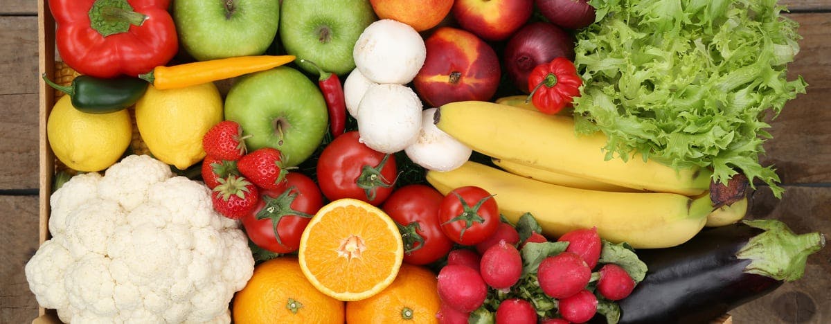 a close up of fruit and veggies