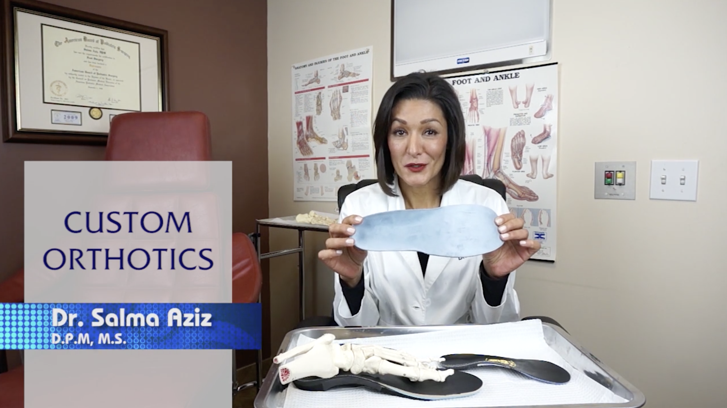 Dr. Aziz doing a video talking about custom orthotics