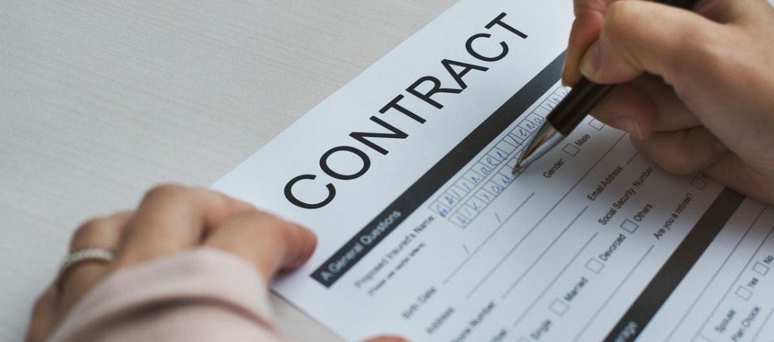 employee-signing-contract