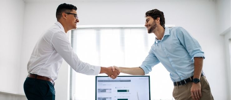 men-shaking-hands-at-exit-interview