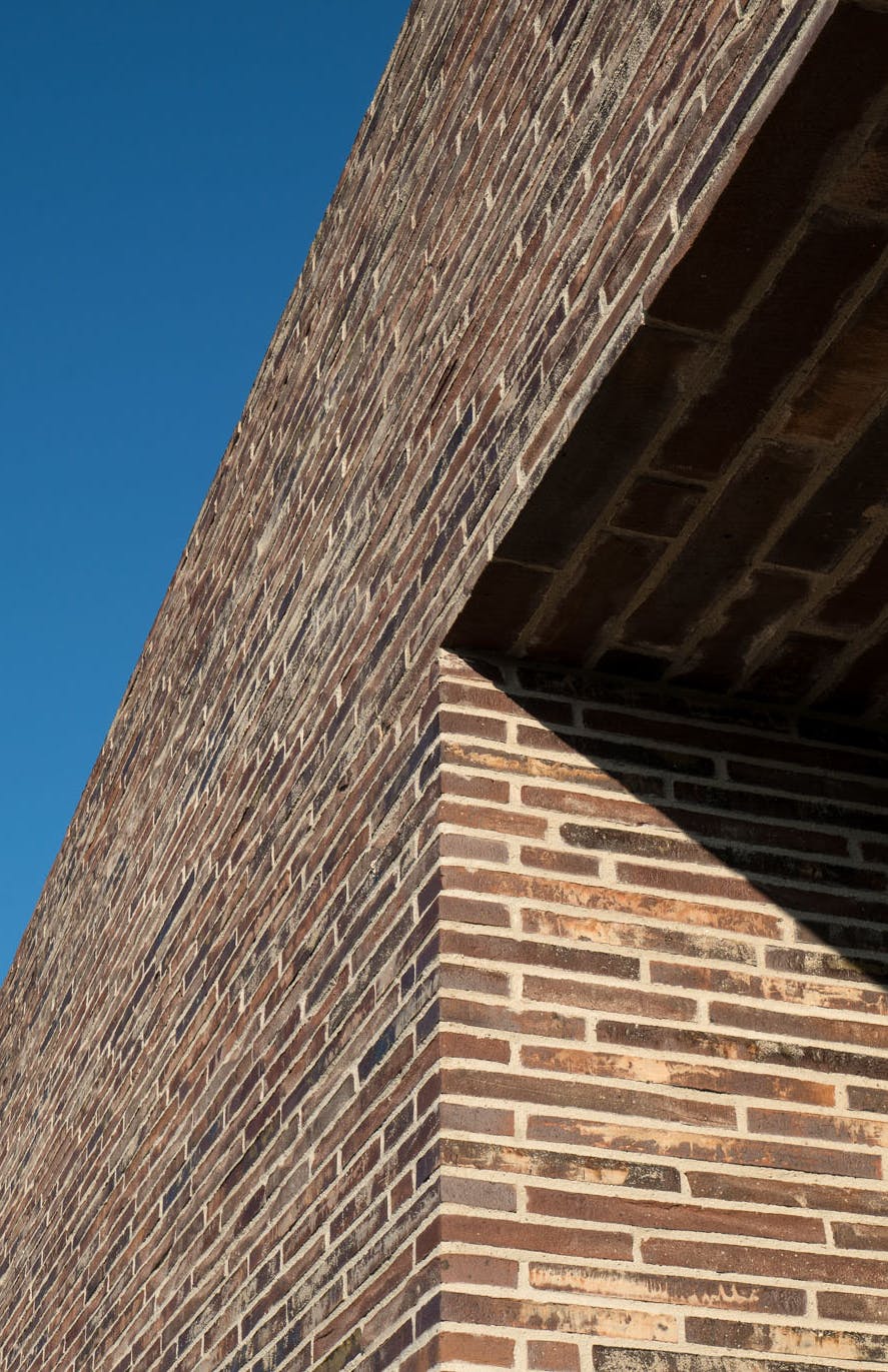 WINERY-Architecture winery bricks View on the bricks of the winery with the blu sky in background