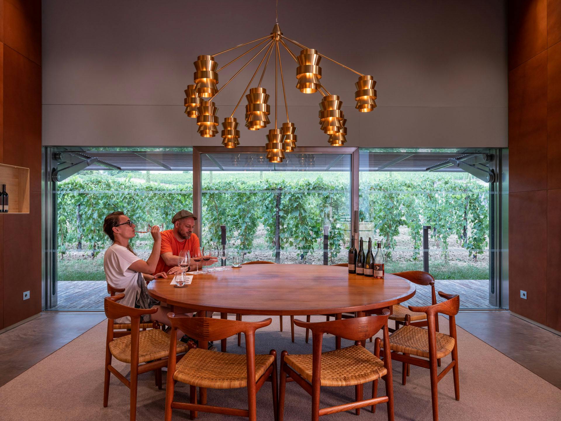 A couple is tasting Fabbrica wines in the main tasting room
