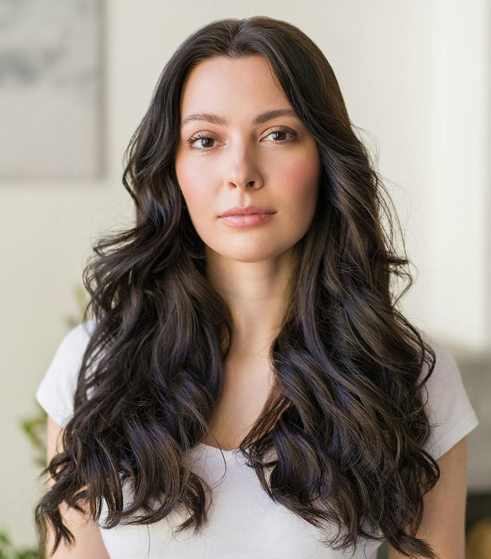 dark haired woman front facing