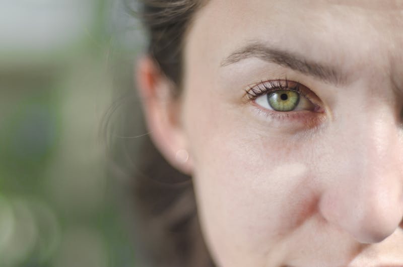 woman with green eye