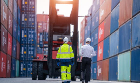 Workers in shipping yard