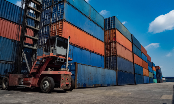 Forklift in shipping yard