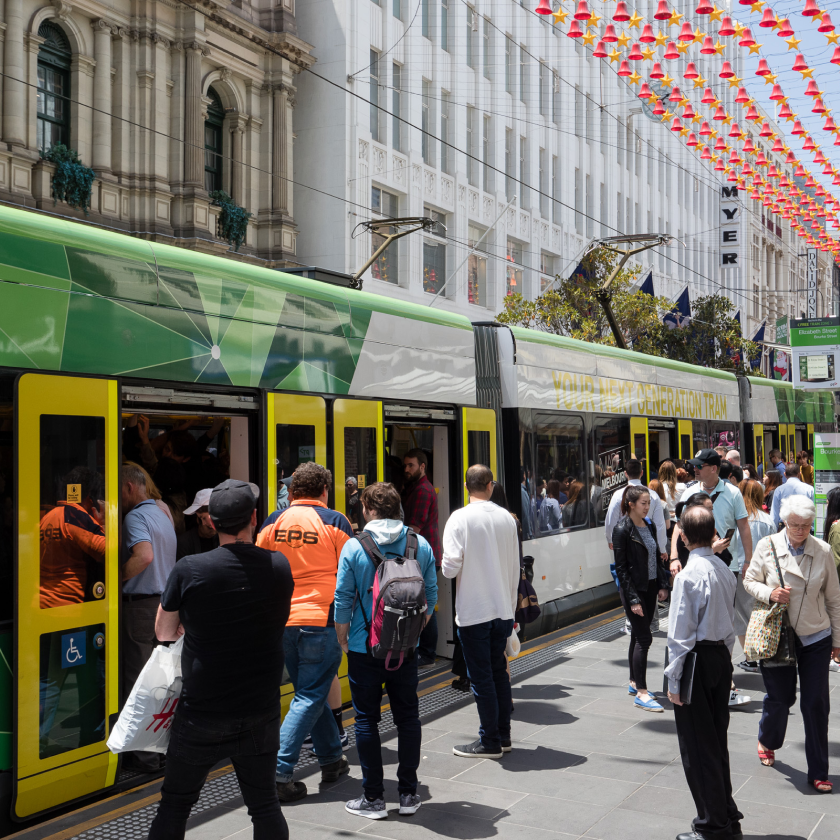 Platform passengers boarding a Yarra Trams